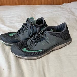 Barley worn, size 9, gray and teal, Nike shoes
